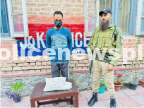 Drug Peddler Arrested