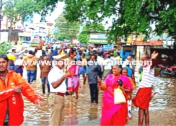 Police working hard in the rain