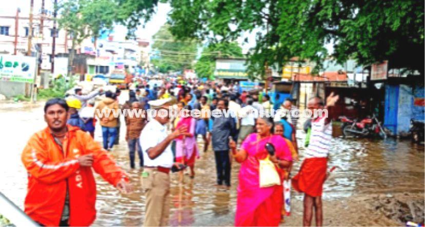 Police working hard in the rain