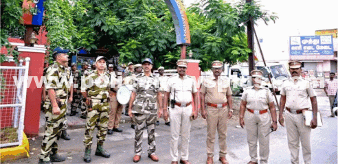 Flag March Ensures Peaceful Counting